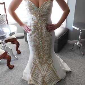 Creme colored embroiled Jovani prom dress